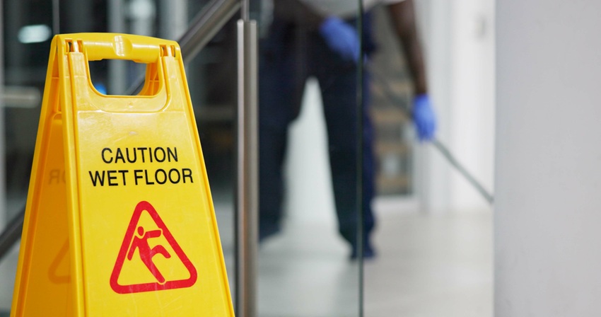 Caution, sign and cleaning for floor, janitor and hygiene service and dark at night in office. Mop,.