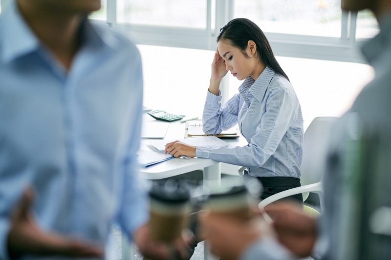 Woman being ignored and mistreated by her male bosses in a San Mateo workplace discrimination suit.